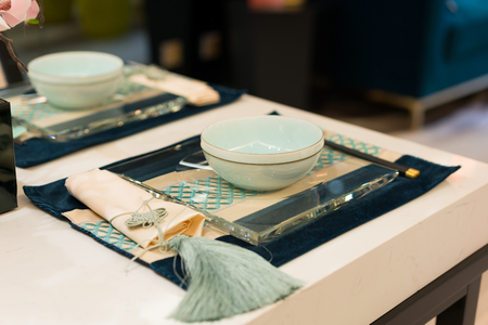 the nice tableware on dining tableの写真素材