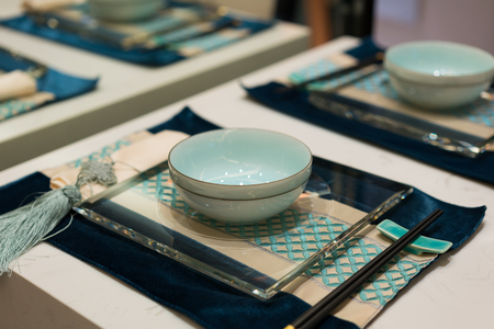 the nice tableware on dining tableの写真素材