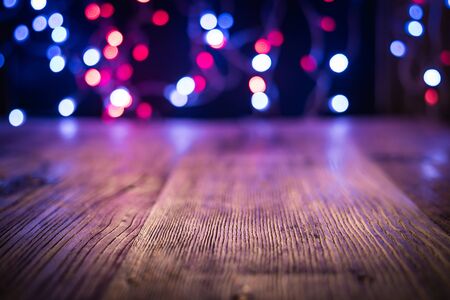 old wood plank with bokeh of light backgroundの写真素材