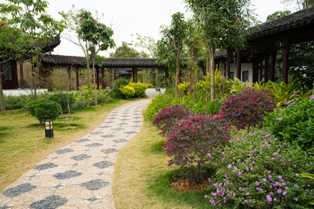 Chinese ancient architecture with nice gardenの写真素材