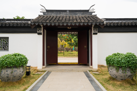 Chinese ancient architecture with nice gardenの写真素材