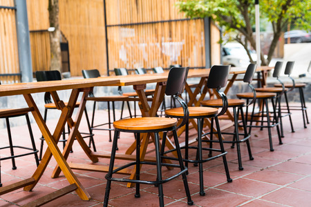 dining table and chair outside the doorの写真素材