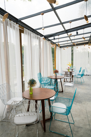 nice restaurant with table and chairsの写真素材