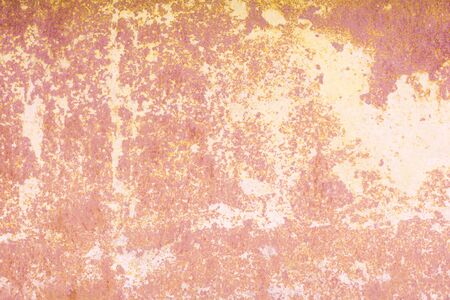 Beige pink coral background of a rusty leaf, stainsの写真素材