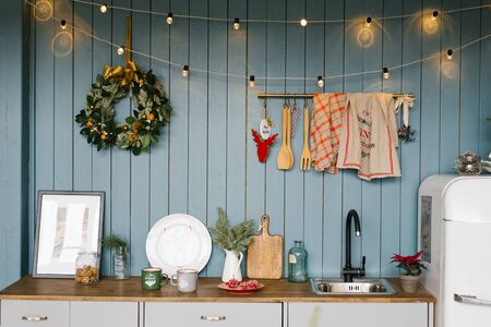Kitchen, decorated for Christmas and New Year in white and blue shades of Scandinavian styleの写真素材