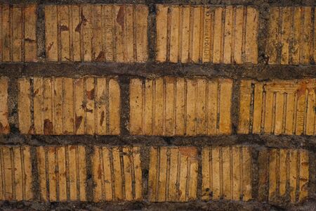 Old dirty red brick masonryの写真素材