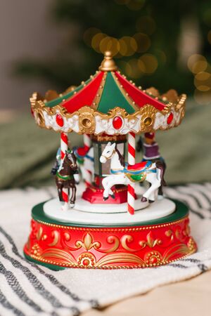 Christmas toy red white green carousel, close-upの写真素材
