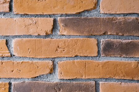 Red brick masonry on the wallの写真素材