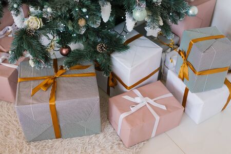 Stylish Christmas gifts under the treeの写真素材