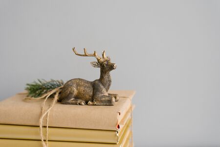 Stylish Christmas deer on books.の写真素材