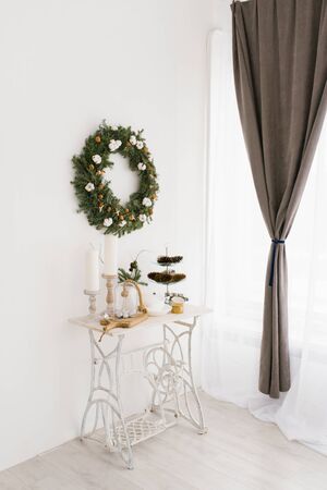 Beautiful delicate decor for Christmas or New Year in the living room or dining room in bright colorsの写真素材
