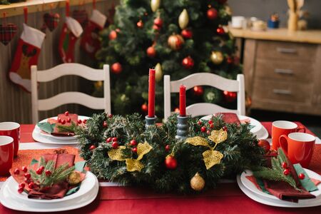 Festive table decor, Christmas dinner table settingの写真素材