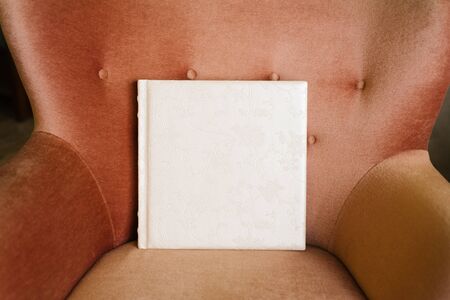 Classic white photo book in leather cover with lace embossingの写真素材