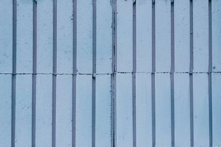 Blue striped concrete wall. Texture background to copy spaceの写真素材