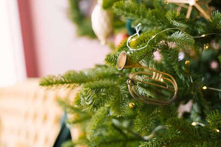Decorated Christmas tree on a blurry, sparkling and fairy-tale background. Toy vintage retro tubeの写真素材