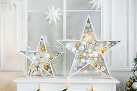 Christmas decor in the living room: stars with filled Christmas balls in themの写真素材