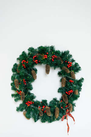 Christmas wreath on a white background with copying spaceの写真素材