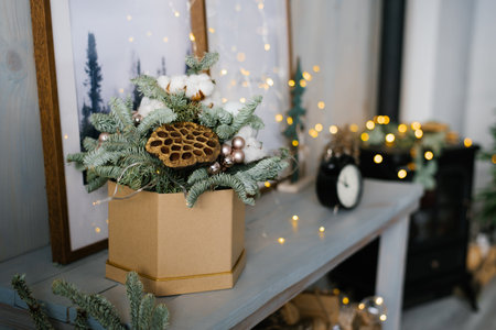 Christmas composition of fir branches, Christmas balls and cotton bolls. Selective focus. Copy space.の写真素材