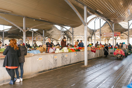 Tashkent, Uzbekistan. December 2020. Shoppers at Chorsu Market in winter