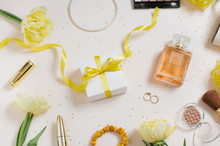 Fashion womens stylish accessories, glam blogger set, flat lay, beige pastel background.の写真素材