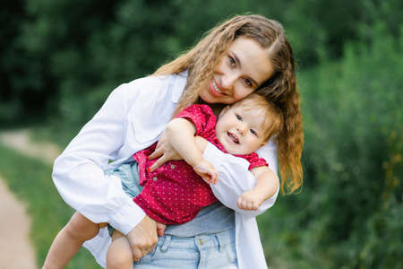 Portrait of a happy young and a baby sonの写真素材
