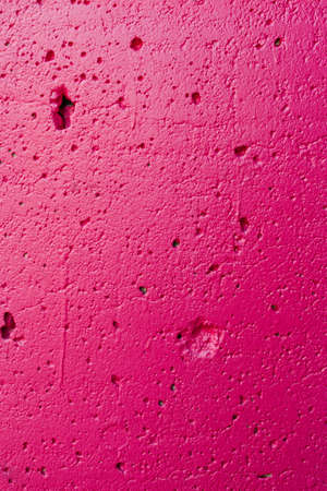 Bright pink plaster wall backgroundの写真素材