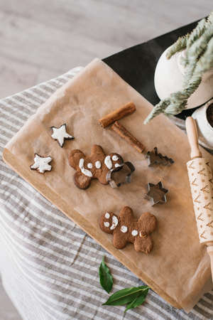 Homemade ginger Christmas cookies, spicy little men, are lying on the table. top view