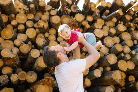 Daddy and baby's son are having fun in the fresh air. A happy family spends a happy time