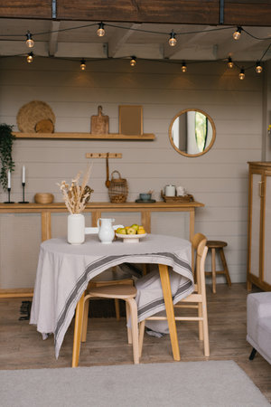 Round table in the kitchen in the style of a country houseの写真素材