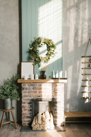 Modern Christmas interior with decorative brick fireplace, Scandinavian styleの写真素材