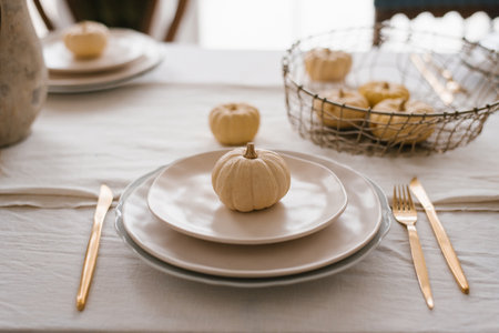 Autumn table setting with pumpkins. Decor about Thanksgivingの写真素材