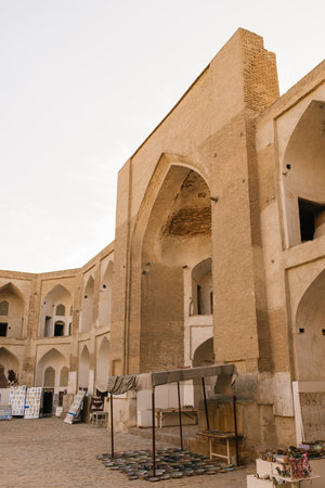Bukhara, Uzbekistan. December 2022. The courtyard of Abdullaziz Khan Madrasah on a sunny dayのeditorial素材