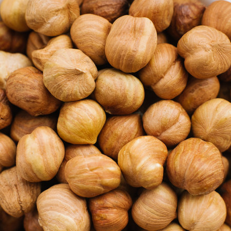 Hazelnuts close-up on a plateの写真素材