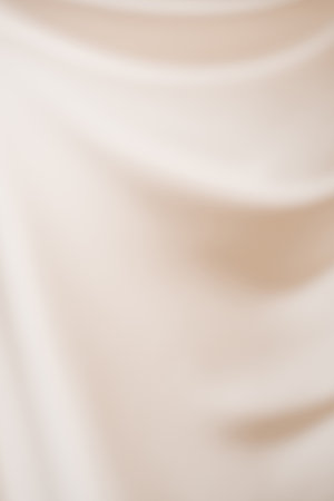 Background of beige fabric with waves.の写真素材
