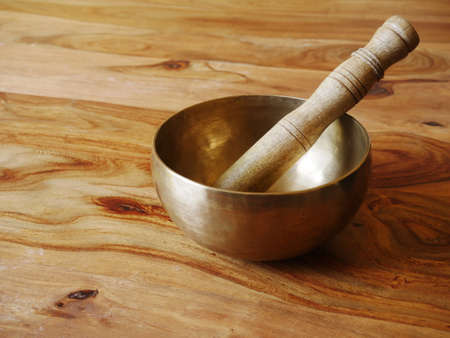 Metal singing bowl for relaxing and receiving healing vibrationsの写真素材