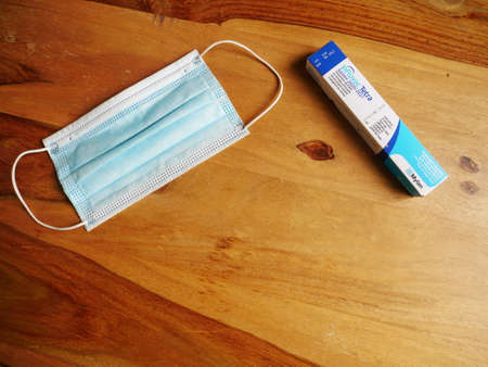 Influenza vaccine called Influvac Tetra, sold in France for the season 2020-2021, with a protective mask. On November 15, 2020 at Frontignan, Franceのeditorial素材