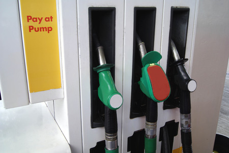 fuelling nozzles. filling station pumpの写真素材