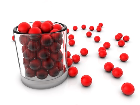 Cup glass and red ballの写真素材