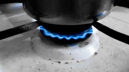The gas flames of an old and dirty stove.