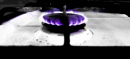 The gas flames of an old and dirty stove.