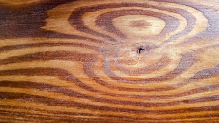 Walnut wood texture. Dark wood texture background surface with old natural patternの写真素材