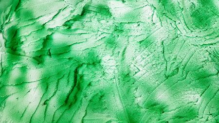 Green sponge texture. Polystyrene foam texture background. old green foam rubber texture as background.の写真素材