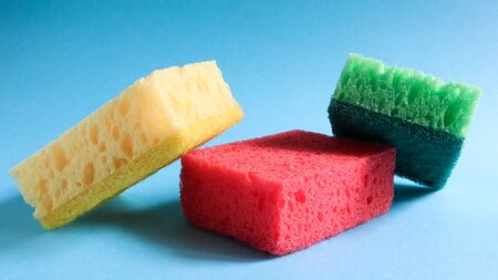 Colorful sponges on blueの写真素材