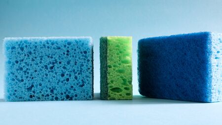 Many blue, red, yellow, green sponges are used to wash and wipe the dirt used by housewives in...