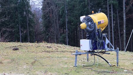 Machine gun, snow cannon for the production of artificial snow in the mountains, preparation for...