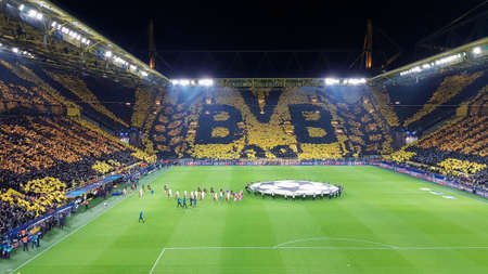 Germany, Dortmund - February 18, 2020. Borussia fans celebrate their teams victory during a match at the BVB home stadium with the French team Paris Saint - Germain, PSG.のeditorial素材