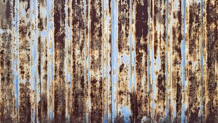 Dark shabby rusty metal texture background. Rusty metal surface with paint.の写真素材