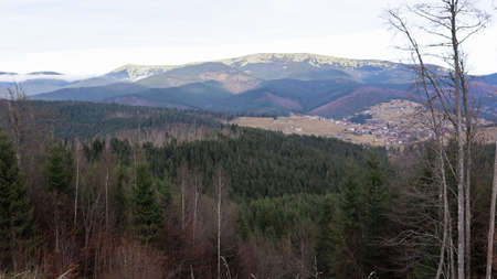 Colorful autumn landscape in the Carpathian mountains with mountain peaks. Carpathians, Ukraine,...