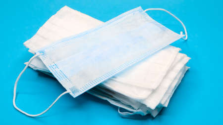 Coronavirus protection. Antiviral protective medical face masks with ear loops. Surgical mask...