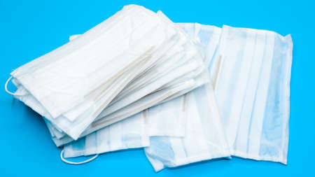 Coronavirus protection. Antiviral protective medical face masks with ear loops. Surgical mask...